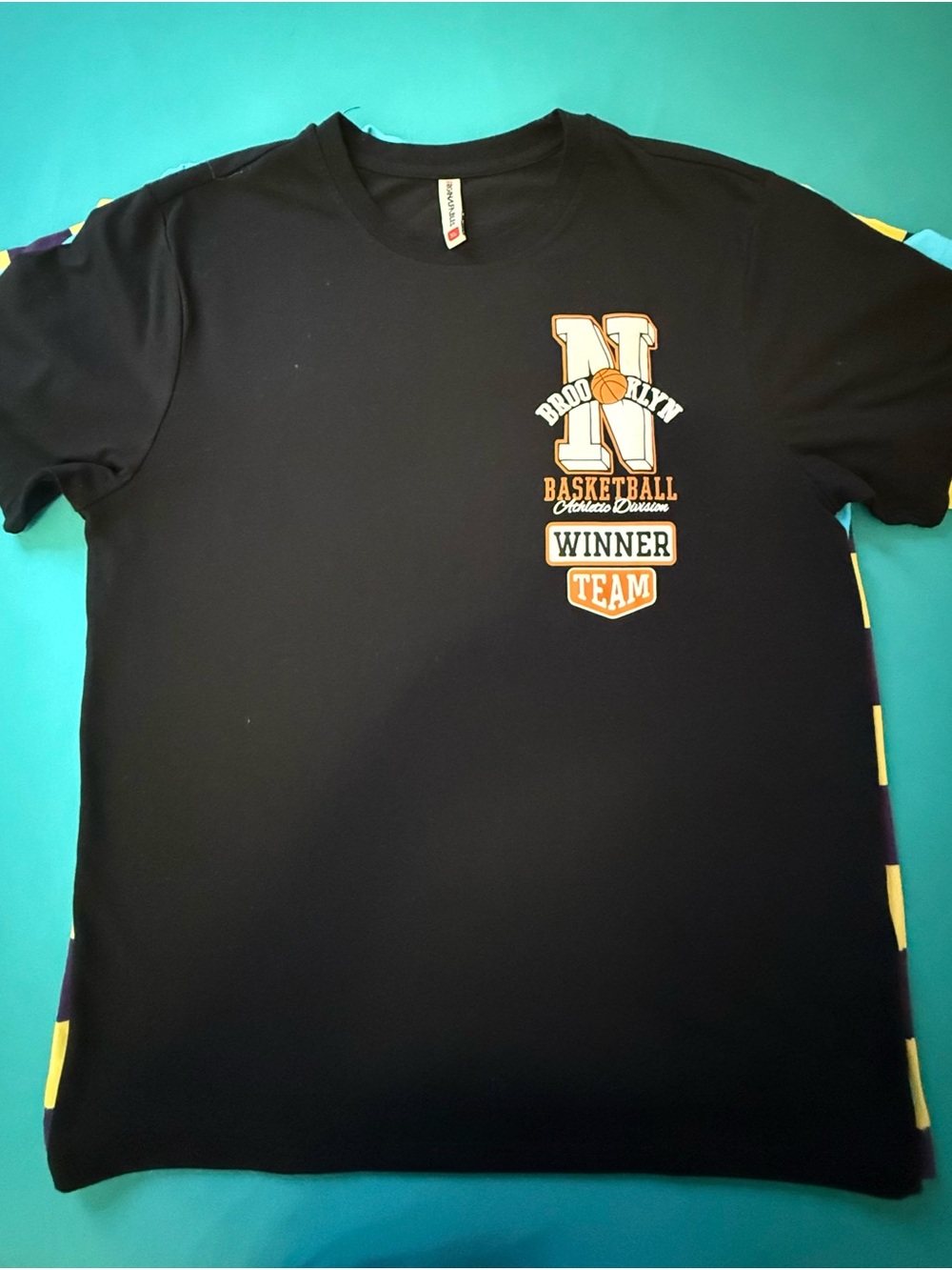 Brooklyn Cloth Black Short Sleeve Graphic Tee with Orange & White Accents